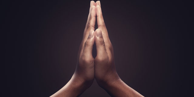 Hands in prayer